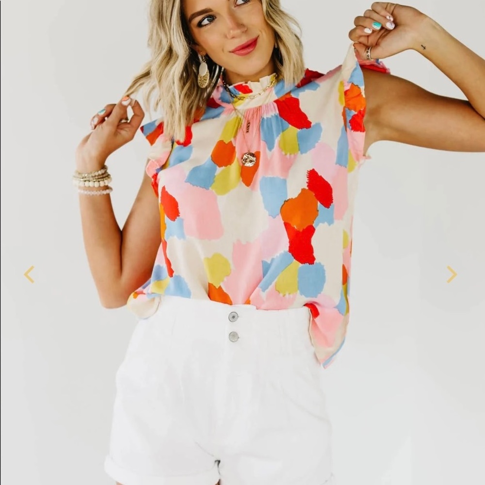 The Lyrica Flutter Sleeve Top